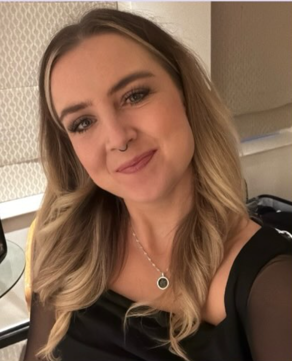 Eve Hodges smiling indoors
